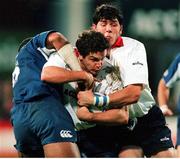 9 October 1998; Leinster's Brian Carey, supported by team-mate Shane Horgan, right, is tackled by Francis Ntamack, Begles-Bordeaux. European Rugby Cup, Leinster v Begles Bordeaux, Donnybrook, Dublin. Picture credit: Matt Browne / SPORTSFILE