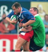 25 September1998; Cliff Mytton, Stade Francais, is tackled by Leinster's Victor Costello. European Rugby Cup, Leinster v Stade Francais, Donnybrook, Dublin. Picture credit: Brendan Moran / SPORTSFILE