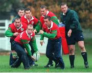 17 November 1998; Ireland players, from left, Eric Elwood, Phil Danagher, Andy Ward, Conor McGuinness, off loads possession, Jeremy Davidson, Allen Clarke and Mick Galwey in action during squad training. Ireland Rugby Squad Training, Greystones RFC, Greystones, Co. Wicklow. Picture credit: Matt Browne / SPORTSFILE