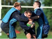 26 October 1998; Ireland's Conor O'Shea is tackled by team-mates Justin Bishop, left, and Dara O'Mahony, right, during squad training. Ireland Rugby Squad Training, Westmanstown Sports Centre, Dublin. Picture credit: Matt Browne / SPORTSFILE