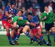 25 September1998; Leinster's Martin Ridge is tackled by Christopher Moni, left, Diego Dominguez, centre, and David Aurabou, Stade Francais. European Rugby Cup, Leinster v Stade Francais, Donnybrook, Dublin. Picture credit: Matt Browne / SPORTSFILE