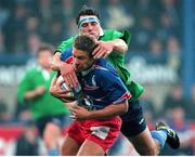 25 September1998; Thomas Lombard, Stade Francais, is tackled by Leinster's Pat Holden. European Rugby Cup, Leinster v Stade Francais, Donnybrook, Dublin. Picture credit: Brendan Moran / SPORTSFILE