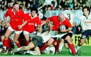 13 December 1998; John Hayes, Munster, is tackled by Patrick Peysson, Colomiers. European Rugby Cup, Colomiers v Munster, Stade Toulouse, Toulouse, France. Picture credit: Matt Browne / SPORTSFILE