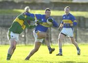 16 January 2005; Fergal O'Callaghan, Tipperary, in action against Stephen O'Sullivan, Kerry. McGrath Cup, Tipperary v Kerry, Clonmel sports field, Clonmel, Co. Tipperary. Picture credit; Ray McManus / SPORTSFILE