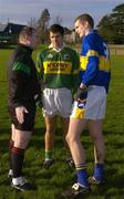 16 January 2005; Referee Martin Collins speaks with Tipperary captain Kevin Mulryan and Kerry captain Ronan O'Connor. McGrath Cup, Tipperary v Kerry, Clonmel sports field, Clonmel, Co. Tipperary. Picture credit; Ray McManus / SPORTSFILE