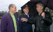 19 January 2005; John O'Shea, right, CEO, GOAL Ireland, speaking with Garda Commisioner Noel Conroy and Dr. Martin McAleese, who took part in the run, left, prior to a 5K Fun Run / Walk, organised by Sergeant Kevin Grogan of Ballyfermot Garda Station, in aid of the Asian Tsunami Disaster. Garda Headquarters, Phoenix Park, Dublin. Picture credit; Brian Lawless / SPORTSFILE