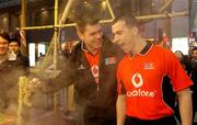 20 January 2005; Fergal Byron, left, Laois, and Dessie Dolan, Westmeath, members of the Vodafone All-Stars teams, sample some of the local 'cuisine' while out shopping in Hong Kong. Picture credit; Ray McManus / SPORTSFILE