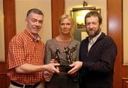 20 January 2005; Pat McEnaney, left, who was presented with his Vodafone GAA Football Referee Award for 2004 by Tara Delaney, Director of Communications, Vodafone Ireland, and GAA President Sean Kelly at a reception on the first day of the All Stars tour to Hong Kong. The Excelsior Hotel, Gloucester Road, Causeway Bay, Hong Kong. Picture credit; Ray McManus / SPORTSFILE