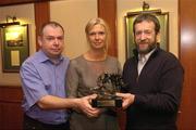 20 January 2005; Aodan Mac Suibhne, left,  who was presented with his Vodafone GAA Hurling Referee Award for 2004 by Tara Delaney, Director of Communications, Vodafone Ireland, and GAA President Sean Kelly at a reception on the first day of the All Stars tour to Hong Kong. The Excelsior Hotel, Gloucester Road, Causeway Bay, Hong Kong. Picture credit; Ray McManus / SPORTSFILE