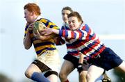 20 January 2005; Eddie O'Mahony, Skerries Community College, in action against Simon Shortt, Templeogue Community College. Leinster Schools Vinnie Murray Senior Cup, Templeogue College v Skerries Community College, Dr. Hickey Park, Greystones, Co. Wicklow. Picture credit; Damien Eagers / SPORTSFILE