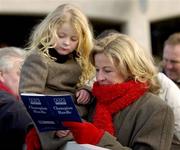 23 January 2005; Mary Kavanagh, from Naas Co.Kildare, studies the form with her 4 1/2 year old daughter Annie. Leopardstown Racecourse, Dublin. Picture credit; Matt Browne / SPORTSFILE
