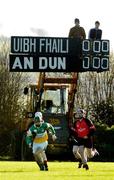 23 January 2005; Keron O'Brien, right, and Eoin Doorley watch the action from the scoreboard. Walsh Cup, Offaly v Down, Carrig and Riverstown GAA Club, Carrig, Co. Tipperary. Picture credit; Damien Eagers / SPORTSFILE