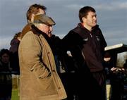 23 January 2005; Offaly manager John McIntyre, right, watches the match with his two selectors Daithi Regan, partially hidden, and Paudge Mulhare. Walsh Cup, Offaly v Down, Carrig and Riverstown GAA Club, Carrig, Co. Tipperary. Picture credit; Damien Eagers / SPORTSFILE