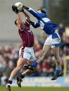 23 January 2005; John Brennan, Westmeath, in action against Padraig McMahon, Laois. O'Byrne Cup Final, Westmeath v Laois, Cusack Park, Mullingar, Co. Westmeath. Picture credit; David Maher / SPORTSFILE