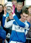 23 January 2005; Noel Garvan, Laois captain, lifts the O'Byrne cup after victory over Westmeath. O'Byrne Cup Final, Westmeath v Laois, Cusack Park, Mullingar, Co. Westmeath. Picture credit; David Maher / SPORTSFILE