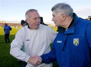 23 January 2005; Westmeath manager Paidi O'Se, left, shakes hands with Laois manager Mick O'Dwyer at the end of the game. O'Byrne Cup Final, Westmeath v Laois, Cusack Park, Mullingar, Co. Westmeath. Picture credit; David Maher / SPORTSFILE