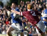 23 January 2005; Gary Kavanagh, Laois, in action against Donal O'Donoghue, Westmeath. O'Byrne Cup Final, Westmeath v Laois, Cusack Park, Mullingar, Co. Westmeath. Picture credit; David Maher / SPORTSFILE