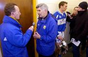 23 January 2005; Mick O'Dwyer, Laois manager, is interviewed for local radio station, while Laois captain Noel Garvan, second from right, is interviewed by reporters after victory over Westmeath. O'Byrne Cup Final, Westmeath v Laois, Cusack Park, Mullingar, Co. Westmeath. Picture credit; David Maher / SPORTSFILE