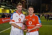 22 January 2005; Matty Forde, Wexford and 2004 Vodafone All-Stars, with Declan Browne, Tipperary and 2003 Vodafone All-Stars. Exhibition Game, 2003 Vodafone All-Stars v 2004 Vodafone All-Stars, Hong Kong Football Club, Hong Kong, China. Picture credit; Ray McManus / SPORTSFILE