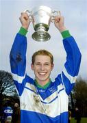 24 January 2005; Russell Cleere, Malahide CS captain, lifts the cup after victory over St Declan's CBS. Dublin Schools Senior Football A Final, St. Declan's CBS v Malahide CS, St. Claire's DCU, Dublin. Picture credit; Damien Eagers / SPORTSFILE