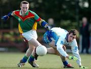 26 January 2005; Peter O'Leary, Carlow IT, in action against Damien Burke, DIT. Datapac Sigerson Cup, Preliminary Round, DIT v Carlow IT, Ballymun Kickhams, Dublin. Picture credit; Pat Murphy / SPORTSFILE