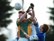 26 January 2005; Tom Fitzpatrick, Carlow IT, in action against Davy Hoare, right, DIT goalkeeper and Paul Begley, partially hidden, DIT. Datapac Sigerson Cup, Preliminary Round, DIT v Carlow IT, Ballymun Kickhams, Dublin. Picture credit; Pat Murphy / SPORTSFILE