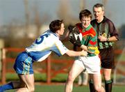 26 January 2005; Tom Fitzpatrick, Carlow IT, in action against Damien Munnelly, DIT. Datapac Sigerson Cup, Preliminary Round, DIT v Carlow IT, Ballymun Kickhams, Dublin. Picture credit; Pat Murphy / SPORTSFILE