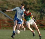 26 January 2005; Tom Walsh, DIT, in action against Padraig Bracken, Carlow IT. Datapac Sigerson Cup, Preliminary Round, DIT v Carlow IT, Ballymun Kickhams, Dublin. Picture credit; Pat Murphy / SPORTSFILE
