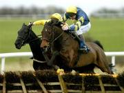 27 January 2005; Billy Bush, with Conor O'Dwyer up, jumps the last ahead of second placed American Jennie, with Barry Cash up, on their way to winning the INH Stallion Farms EBF Novice Hurdle. Thurles Racecourse, Co. Tipperary. Picture credit; Matt Browne / SPORTSFILE