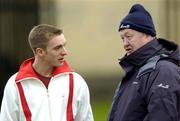 27 January 2005; Laois footballer Ross Munnelly, left, talks with Dublin Selector Dave Billings before the start of the match. Datapac Sigerson Cup, Preliminary Round, Trinity College Dublin v Athlone IT, Santry Avenue, Dublin. Picture credit; Brian Lawless / SPORTSFILE