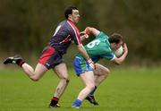 27 January 2005; James Kavanagh, Athlone IT, in action against Bassel Mannion, Trinity College Dublin. Datapac Sigerson Cup, Preliminary Round, Trinity College Dublin v Athlone IT, Santry Avenue, Dublin. Picture credit; Brian Lawless / SPORTSFILE