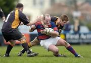 29 January 2005; Dave O'Brien, Clontarf, in action against Chris Keane and Anthony Nash, left, Buccaneers. AIB All Ireland League 2004-2005, Division 1, Clontarf v Buccaneers, Castle Avenue, Dublin. Picture credit; Damien Eagers / SPORTSFILE