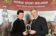 18 November 2013; Rosemary Connors, from Co. Waterford, receives the HSI Breeder of the Top ISH Showjumping Mare 2013 award from Jim Beecher, Chairman of the Breeding Sub- Board HSI, during the HSI Annual Breeder Awards. Bloomfield House Hotel, Mullingar, Co. Westmeath. Picture credit: Barry Cregg / SPORTSFILE