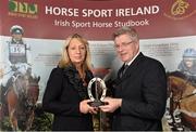 18 November 2013; Mary Quinlivan from Co.Cork, receives the HSI Highest placed ISH at the FEI WBFSH Eventing Championships, Le Lion D'angers  award from Jim Beecher, Chairman of the Breeding Sub- Board HSI, during the HSI Annual Breeder Awards. Bloomfield House Hotel, Mullingar, Co. Westmeath.  Picture credit: Barry Cregg / SPORTSFILE