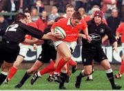 26 September 1998; Cian Mahony, Munster, is tackled by Tristan Davies, left, Matthew McCarthy and Brett Sinkinson, right, Neath. European Rugby Cup, Munster v Neath, Musgrave Park, Cork. Picture credit: Matt Browne / SPORTSFILE