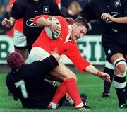 26 September 1998; Cian Mahony, Munster, is tackled by Brett Sinkinson, Neath. European Rugby Cup, Munster v Neath, Musgrave Park, Cork. Picture credit: Matt Browne / SPORTSFILE
