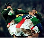 24 November 1998; Braam Van Straaten, South Africa, is tackled by Anthony Foley, Combined Provinces. Rugby fiendly, Combined Provinces v South Africa, Musgrave Park, Cork. Picture credit: Matt Browne / SPORTSFILE
