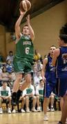 29 January 2005; Scott Kinevane, Galwey Auctioneering Hoops, in action against Arturas Gavenia (12) and Daniel O'Mahony, Mardyke UCC Demons. National Cup, Junior Men's Final, Mardyke UCC Demons v Galwey Auctioneering Hoops, Dublin, ESB Arena, Tallaght, Dublin. Picture credit; Brendan Moran / SPORTSFILE