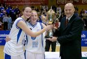 29 January 2005; Sligo Allstars' co-captains Edel Kelly, left, and Stephanie O'Reilly receive the cup from Tony Colgan, President, Basketball Ireland. National Cup, Junior Women's Final, Sligo Allstars v Bausch and Lomb Wildcats, Waterford, ESB Arena, Tallaght, Dublin. Picture credit; Brendan Moran / SPORTSFILE