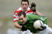 30 January 2005; Johnny Murphy, Limerick, in action against Robert Mageean, Cork IT. McGrath Cup Final, Limerick v Cork IT, Gaelic Grounds, Limerick. Picture credit; Matt Browne / SPORTSFILE