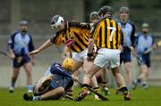 30 January 2005; David Curtin, Dublin, under pressure from Kilkenny players JJ Delaney, 7, and Colin Herity. Walsh Cup, Dublin v Kilkenny, Parnell Park, Dublin. Picture credit; Ray McManus / SPORTSFILE
