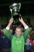 30 January 2005; John Quane, Limerick captain, lifts the McGrath cup after victory over Cork IT. McGrath Cup Final, Limerick v Cork IT, Gaelic Grounds, Limerick. Picture credit; Matt Browne / SPORTSFILE