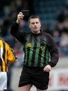 30 January 2005; Referee Barry Gavin, Offaly, shows the note book to a player during the game. Walsh Cup, Dublin v Kilkenny, Parnell Park, Dublin. Picture credit; Ray McManus / SPORTSFILE