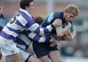 31 January 2005; Frank Kearney, St. Michael's College, is tackled by David Kearney and Kyle O'Brien, partially hidden, Clongowes Wood. Leinster Schools Senior Cup, First Round, Clongowes Wood v St. Michael's College, Donnybrook, Dublin. Picture credit; Pat Murphy / SPORTSFILE