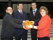 1 February 2005; Dublin County Footballers and Bank of Ireland employees Colin Moran, left, and Ray Cosgrove with Special Olympics athletes Damien Byrne, left, from Templeogue, Dublin, and Agnes Roe, Rossmore, Templeogue, Dublin, at the announcement by Bank of Ireland that 50 Special Olympics Networks have been registered since the programme was launched 12 months ago. Bank of Ireland Head Office, Lower Baggot Street, Dublin. Picture credit; Damien Eagers / SPORTSFILE