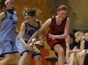 1 February 2005; Holly Coomey, supported by team-mate Leah Weste, left, Colaiste Choilm Ballincollig, Cork, in action against Tina Thornton, St. Paul's Oughterard, Galway. All-Ireland Schools Cup, Cadette B Final, Colaiste Choilm Ballincollig, Cork, v St. Paul's Oughterard, Galway, National Basketball  Arena, Tallaght, Dublin. Picture credit; Brian Lawless / SPORTSFILE