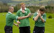 1 February 2005; Alan Quinlan sprays team-mate Ronan O'Gara with some Sure for Men deodorant as team-mate Paul O'Connell looks on at a photocall to launch Sure For Men as the Official Deodorant to the Irish Rugby Team. Citywest Hotel, Dublin. Picture credit; Brendan Moran / SPORTSFILE