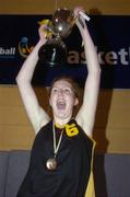 1 February 2005; Team captain Joanne Ni Mhathuna, Colaiste Iosagain, Dublin, lifts the cup after victory in the final. All-Ireland Schools Cup, Senior A Final, Mercy Heights Skibereen, Cork, v Colaiste Iosagain, Dublin, National Basketball Arena, Tallaght, Dublin. Picture credit; Brian Lawless / SPORTSFILE