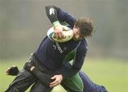 2 February 2005; Ireland's Gordon D'Arcy in action against Ronan O'Gara during squad training. Ireland Rugby squad training, Terenure Rugby Club, Dublin. Picture credit; Matt Browne / SPORTSFILE