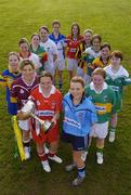 3 February 2005; Players at the launch of the 2005 Suzuki Ladies National Football League in Cork Institute of Technology are, clockwise, from front, Anne Marie O'Shea, Louth, Valerie Mulcahy, Galway, Una Downes, Roscommon, Grainne Ni Fhlatharta, Tyrone, Mary Hayes, Carlow, Anne Marie Walsh, Kildare, Emma Donovan, Monaghan, Juliet Murphy, Cork, Lisa Brick, Kilkenny, Katie Gleeson, Donegal, Claire Peters, Wexford, Mairead Kelly, Limerick, Patrice Dennehy, Kerry, and Mary O'Rourke, Dublin. This will be the 27th Ladies National Football League and the 3rd year the competition will be sponsored by Suzuki Ireland. Picture credit; Brendan Moran / SPORTSFILE